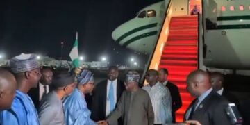 President Tinubu Returns to Abuja from Paris, Cuts Short Working Vacation (Photo+Video)